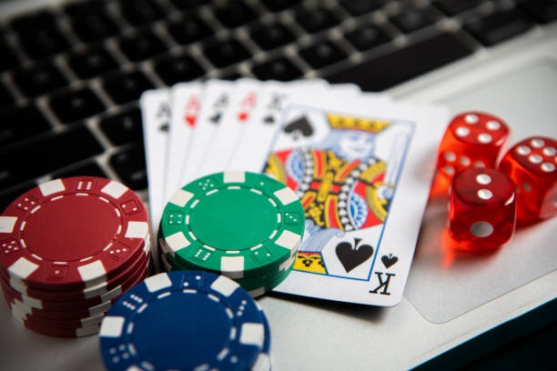 Live dealer showing community cards in Casino Hold'em game